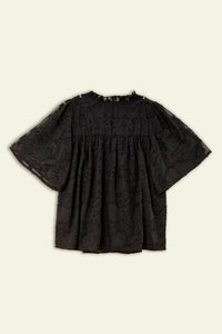 A line blouse with ruffle trim